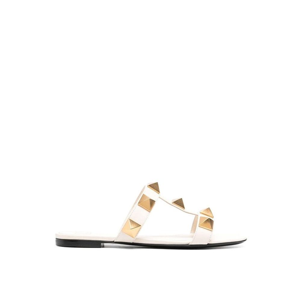 Sandales plates en cuir à clous romains Valentino Garavani