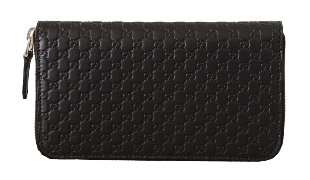 Elegant women's designer wallets in black with textured pattern and sleek zip closure