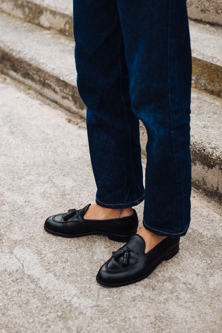 Stylish black men's fashion loafers online paired with casual denim jeans