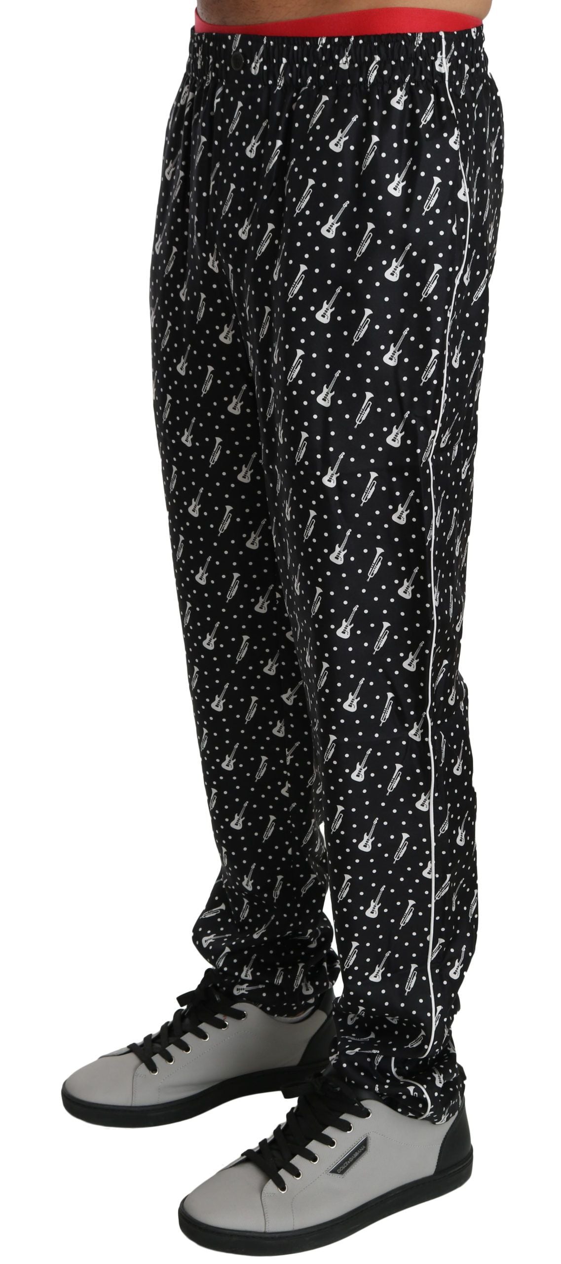 Dolce &amp; Gabbana Elegante schwarze Seidenhose mit Musikinstrumenten-Print