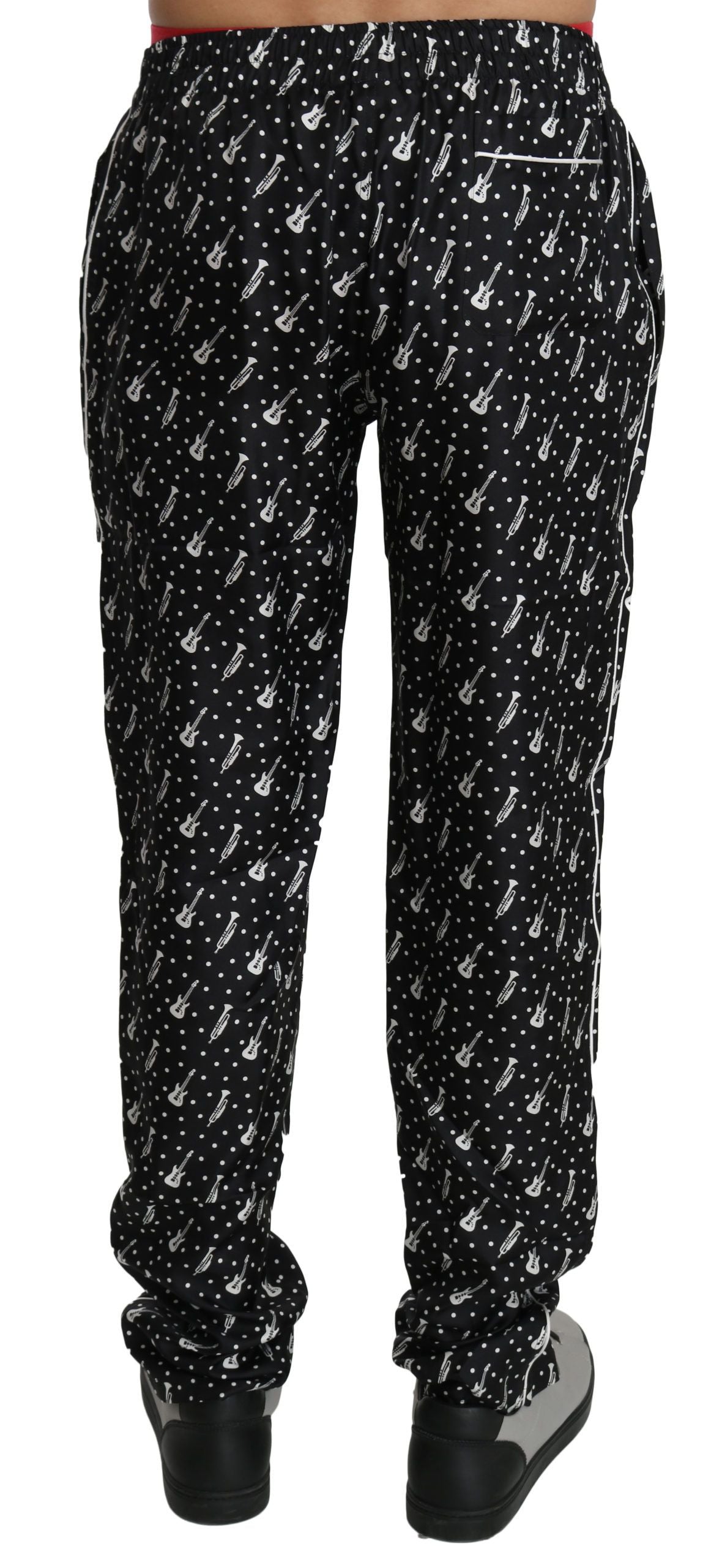 Dolce &amp; Gabbana Elegante schwarze Seidenhose mit Musikinstrumenten-Print