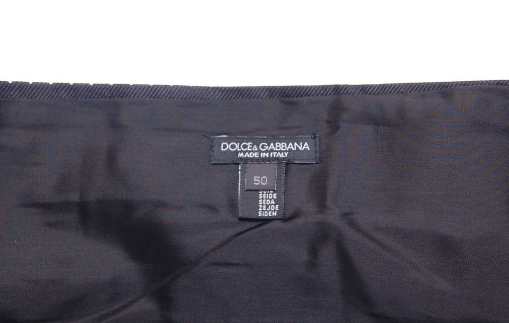 Dolce &amp; Gabbana Élégante ceinture de smoking en soie noire à pois