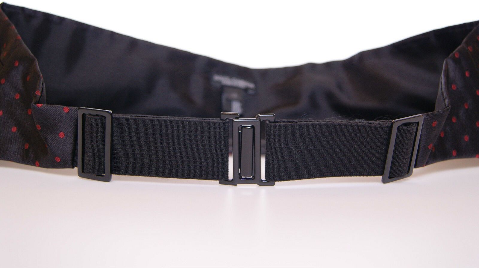 Dolce &amp; Gabbana Élégante ceinture de smoking en soie noire à pois rouges