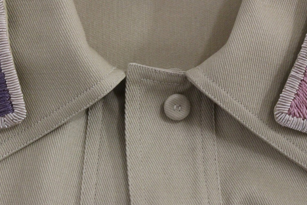 Débardeur sans manches en coton beige avec broches Andrea Incontri