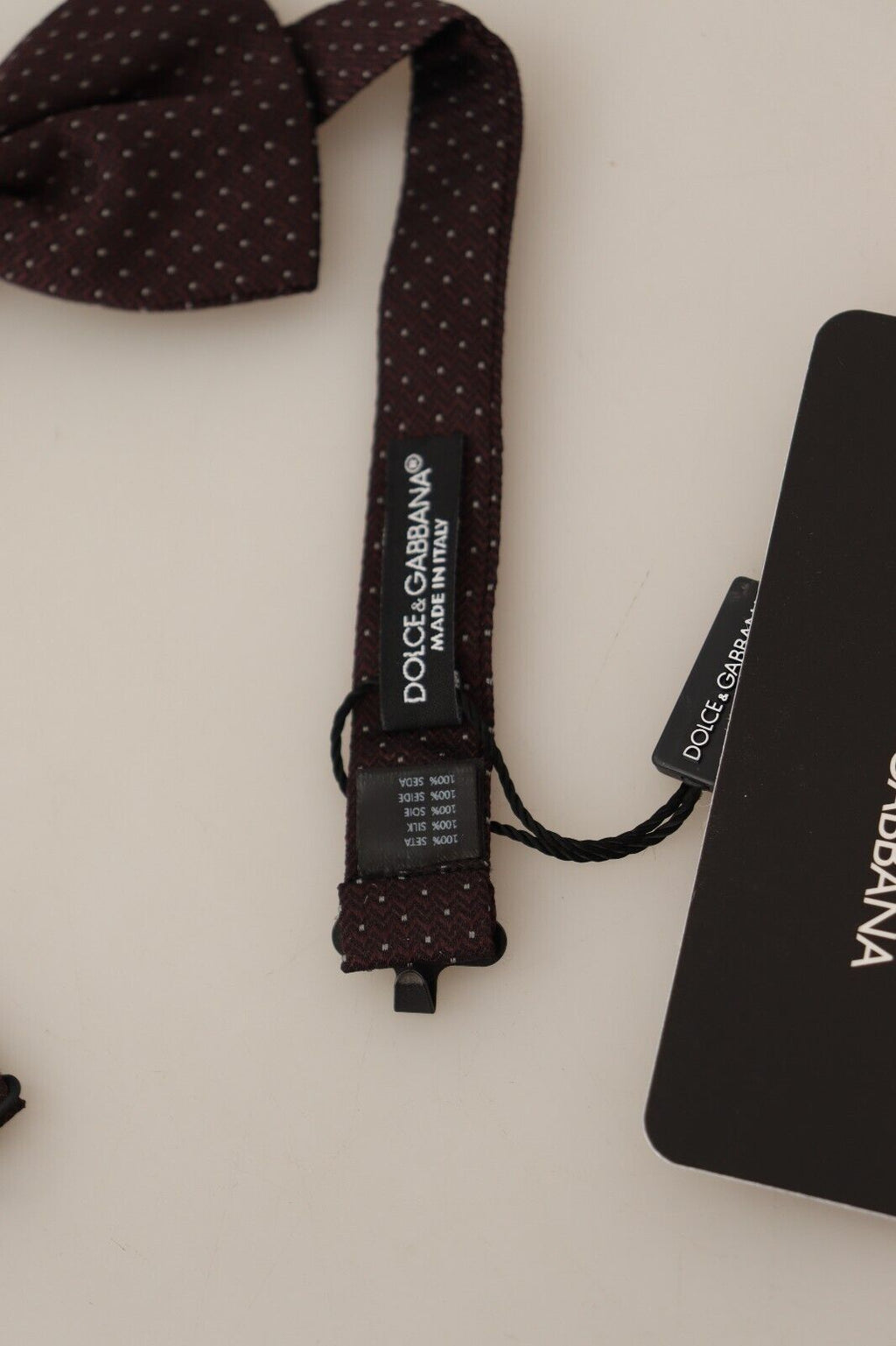 Dolce &amp; Gabbana Elegante braune Seidenfliege mit Punktmuster