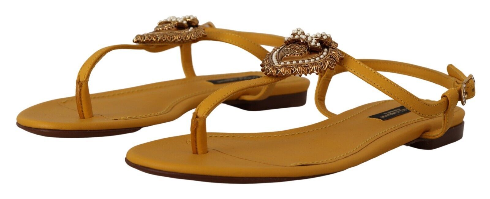 Sandales plates Dolce &amp; Gabbana moutarde à brides en T et ornements en forme de cœur