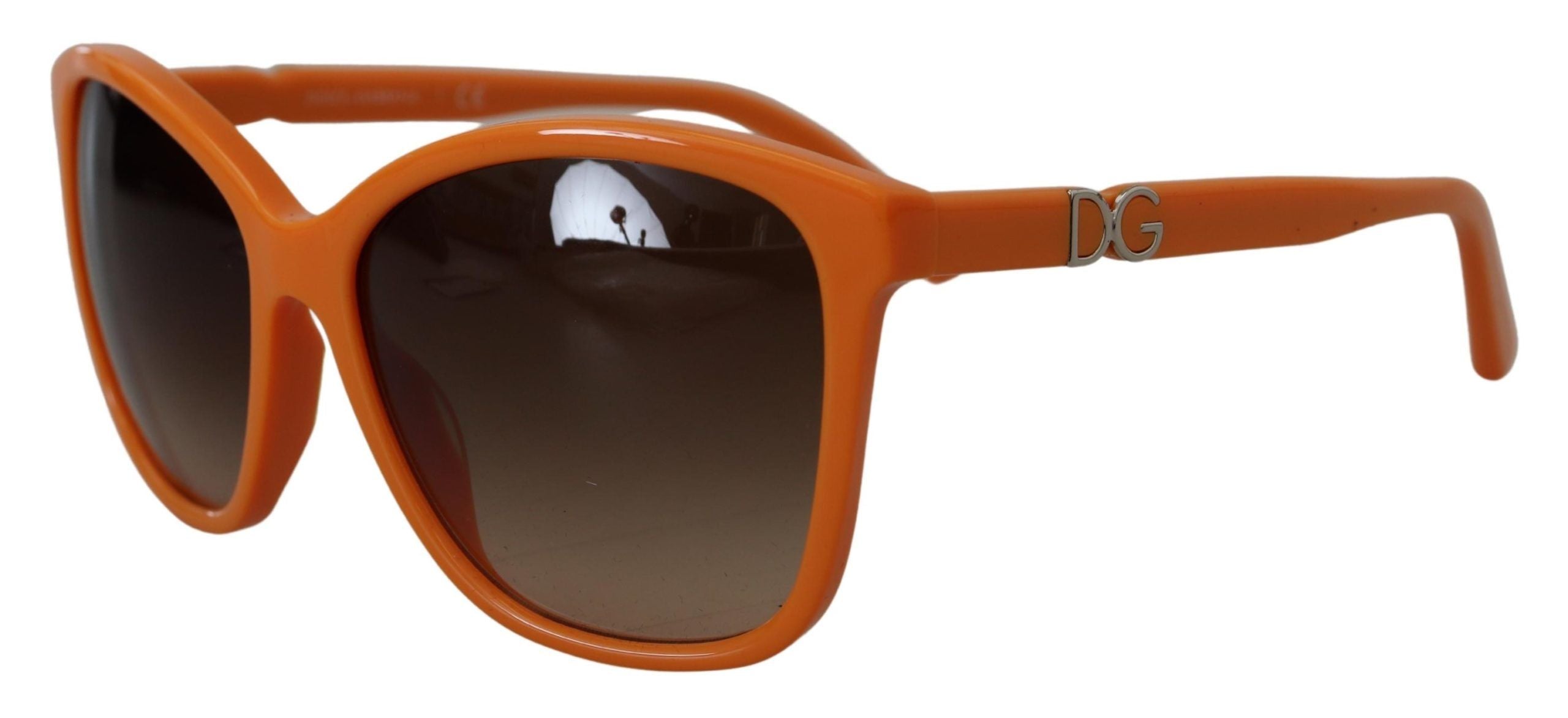 Dolce &amp; Gabbana Schicke orange runde Sonnenbrille für Damen
