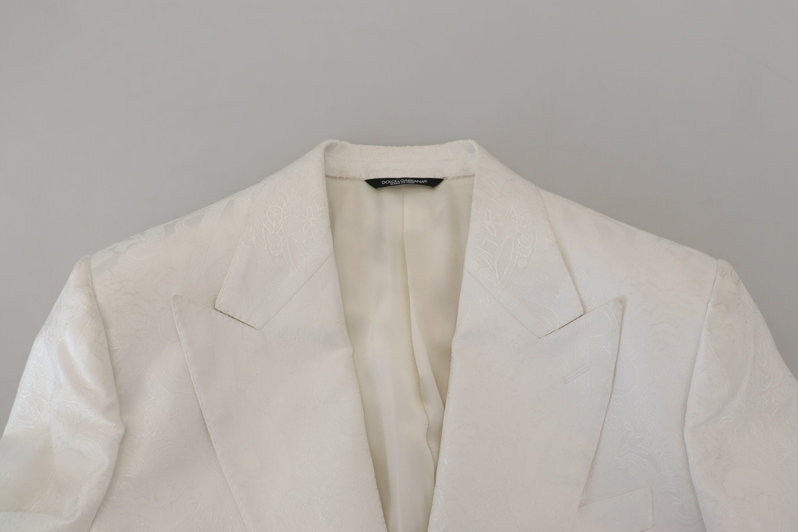 Trench-coat élégant en brocart floral blanc Dolce &amp; Gabbana