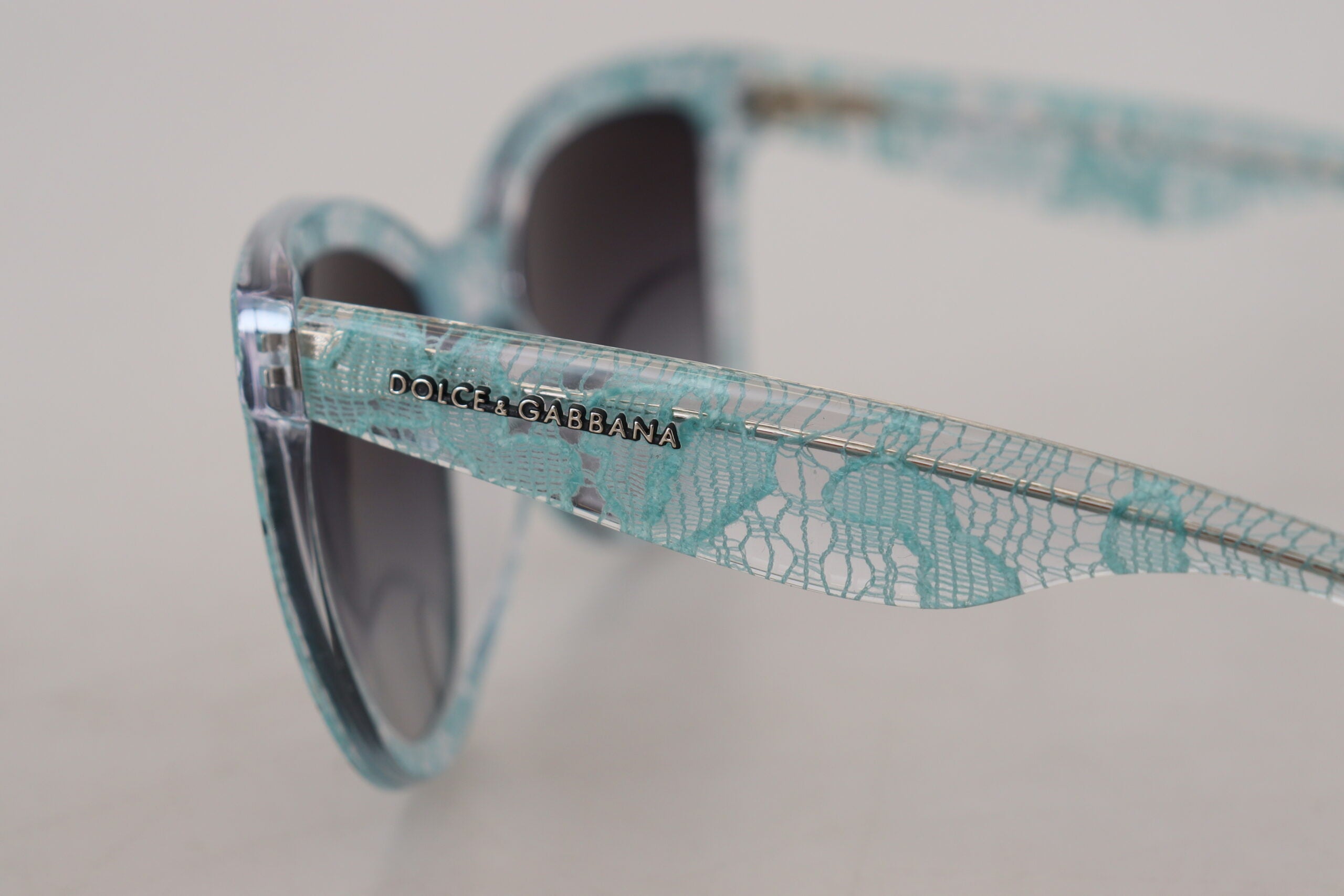 Dolce &amp; Gabbana Elegante Sonnenbrille mit blauem Spitzendetail