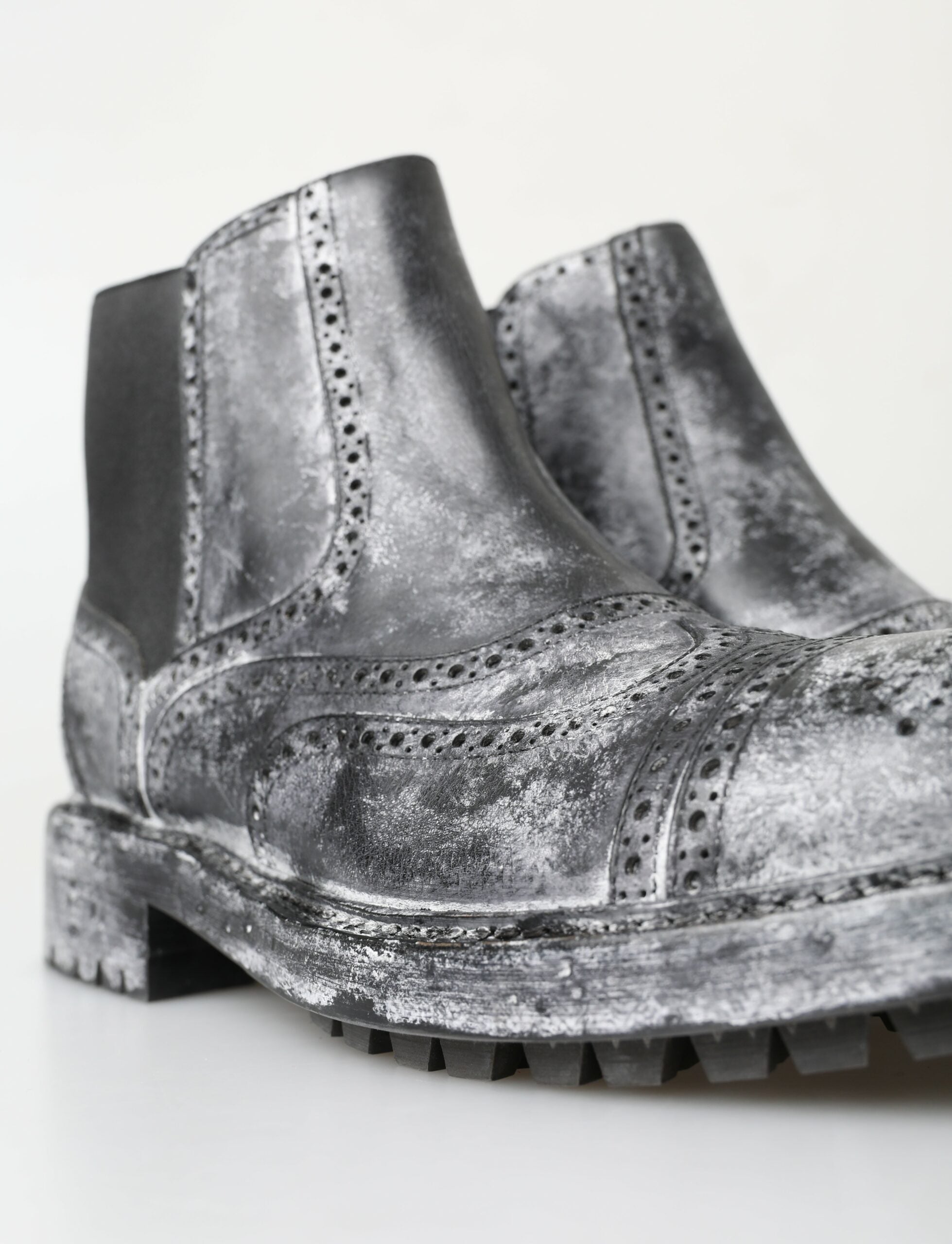 Dolce &amp; Gabbana – Elegante, schwarze Chelsea-Stiefeletten mit verblasstem Muster