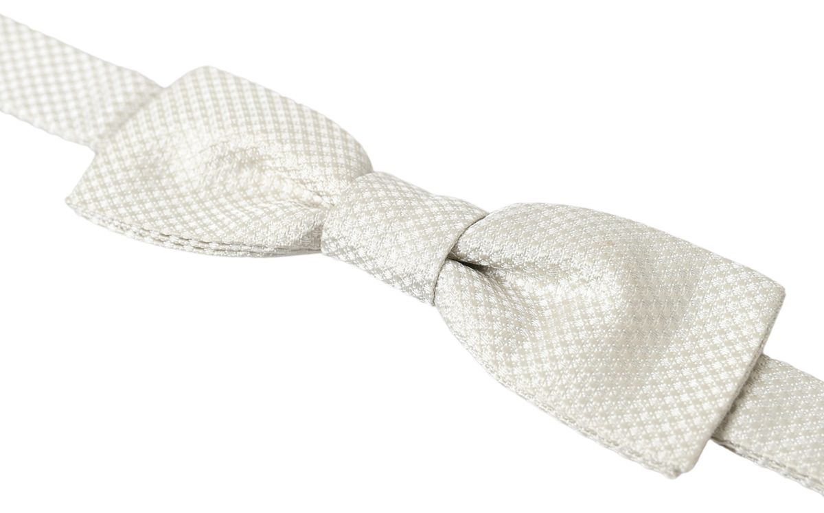 Dolce &amp; Gabbana Elegante elfenbeinfarbene Seidenfliege