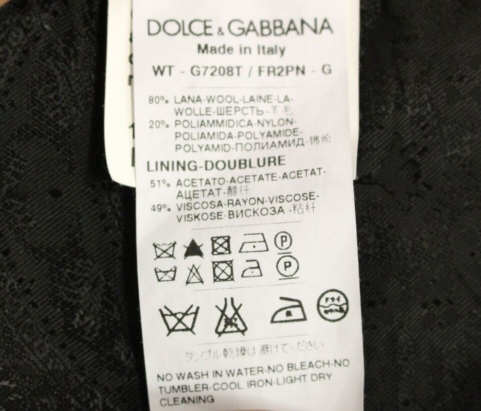 Dolce &amp; Gabbana Élégant gilet à rayures noires à boutonnage simple
