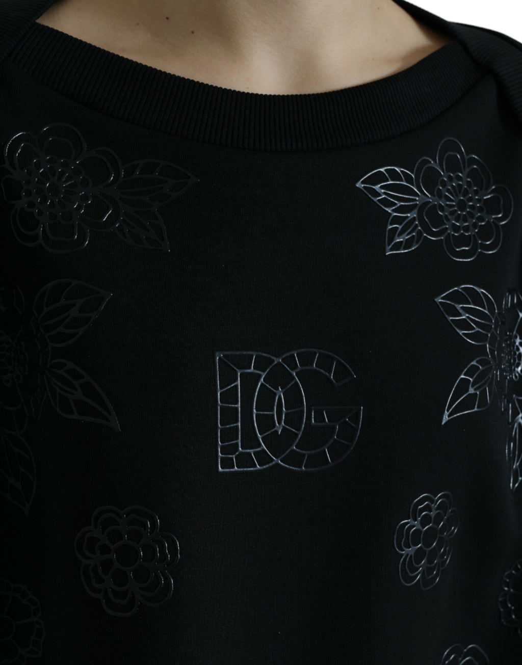 Dolce &amp; Gabbana – Eleganter schwarzer Pullover mit Blumenapplikation