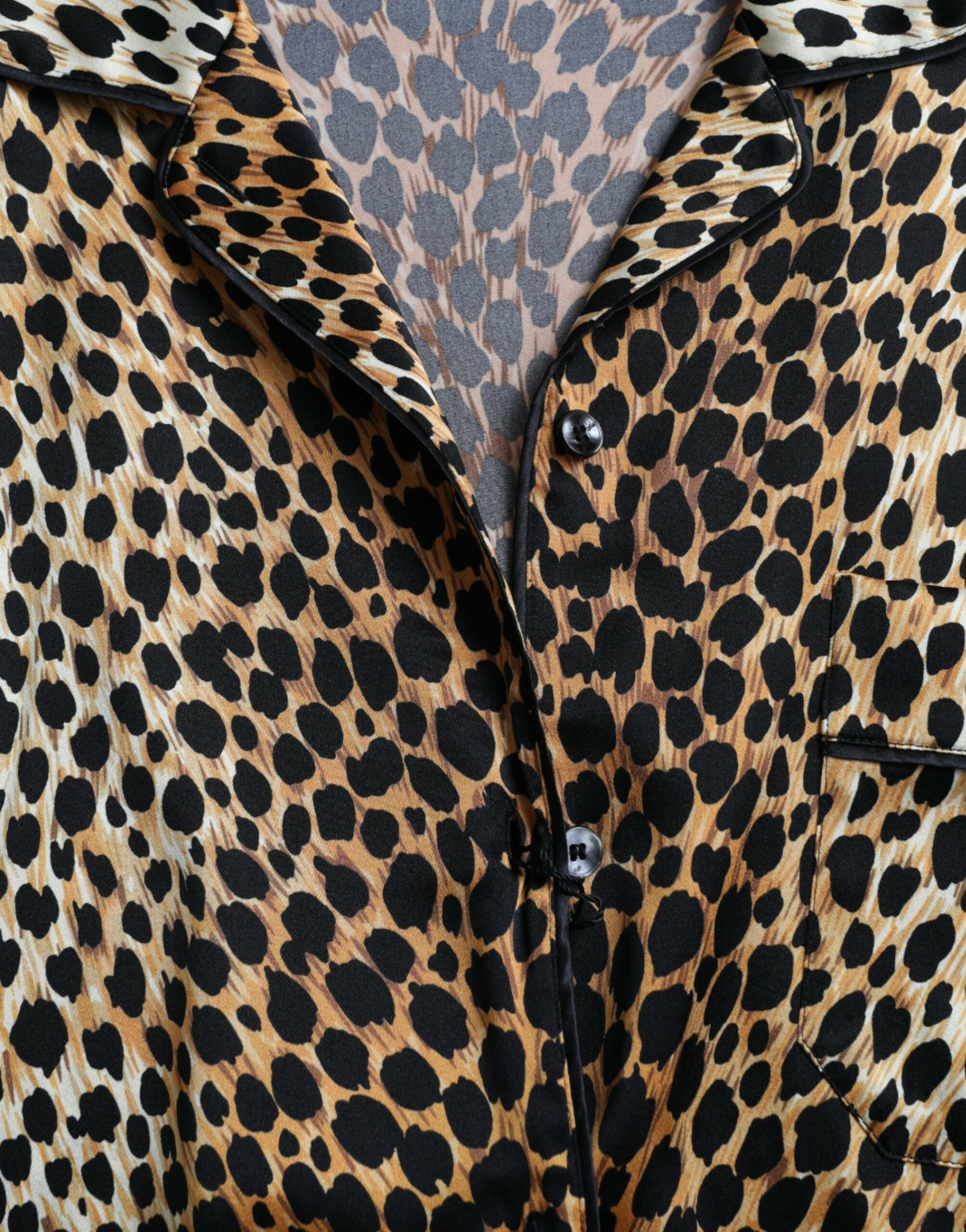 Dolce &amp; Gabbana Elegante braune Seidenbluse mit Animalprint