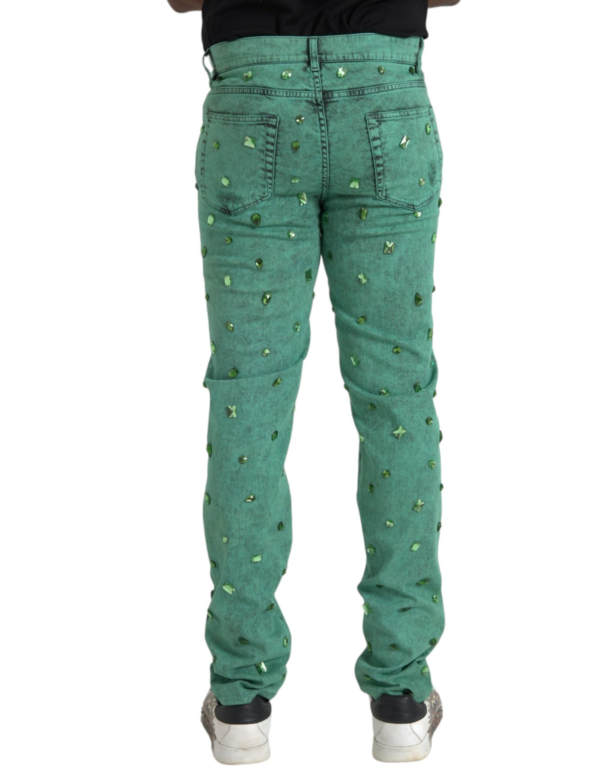 Dolce &amp; Gabbana – Eng anliegende Jeans aus Baumwollstretch mit grünen Kristallen