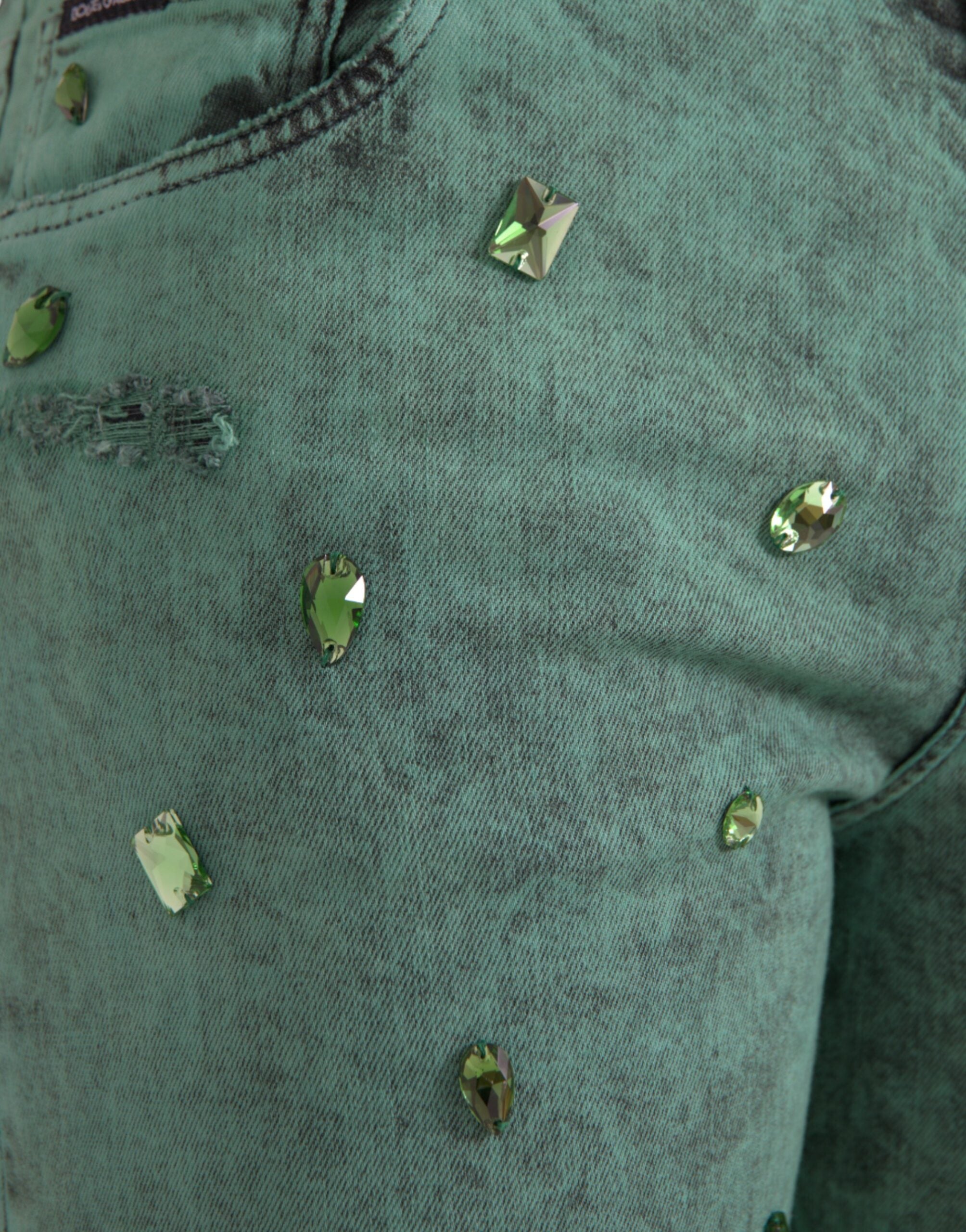 Dolce &amp; Gabbana – Eng anliegende Jeans aus Baumwollstretch mit grünen Kristallen