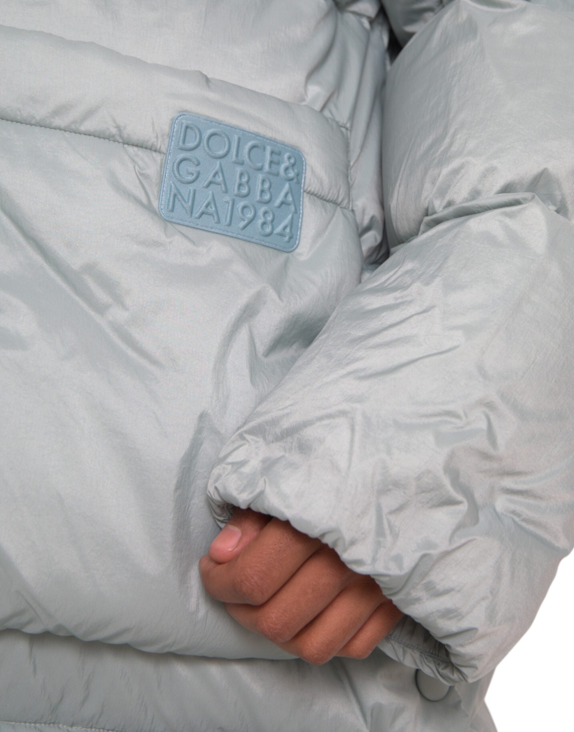 Dolce &amp; Gabbana Doudoune matelassée à capuche bleu clair pour homme