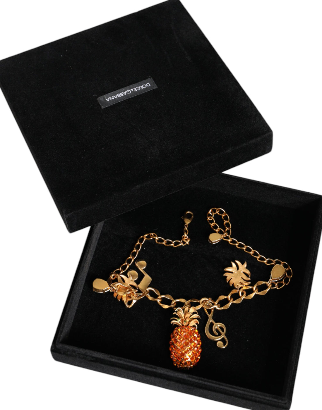 Dolce &amp; Gabbana – Goldfarbene Messingkette mit Ananas-Kristall und Musik-Anhänger