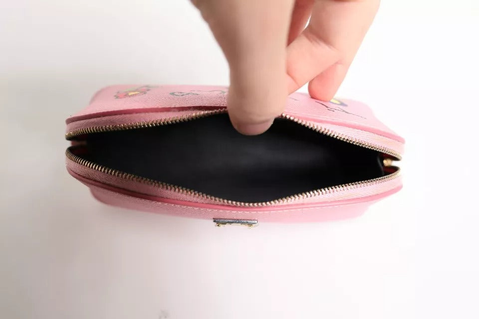 Portefeuille à fermeture éclair en cuir rose Dolce &amp; Gabbana avec logo DG