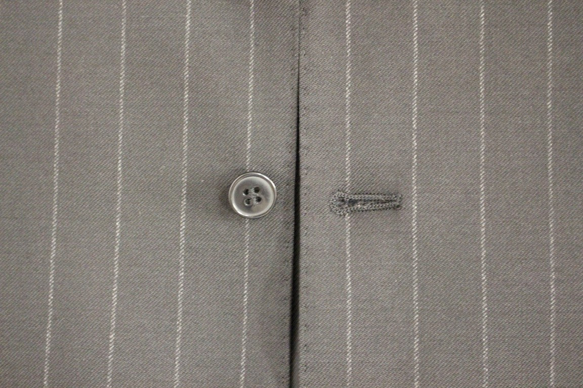 Dolce &amp; Gabbana Élégant gilet en laine à rayures noires