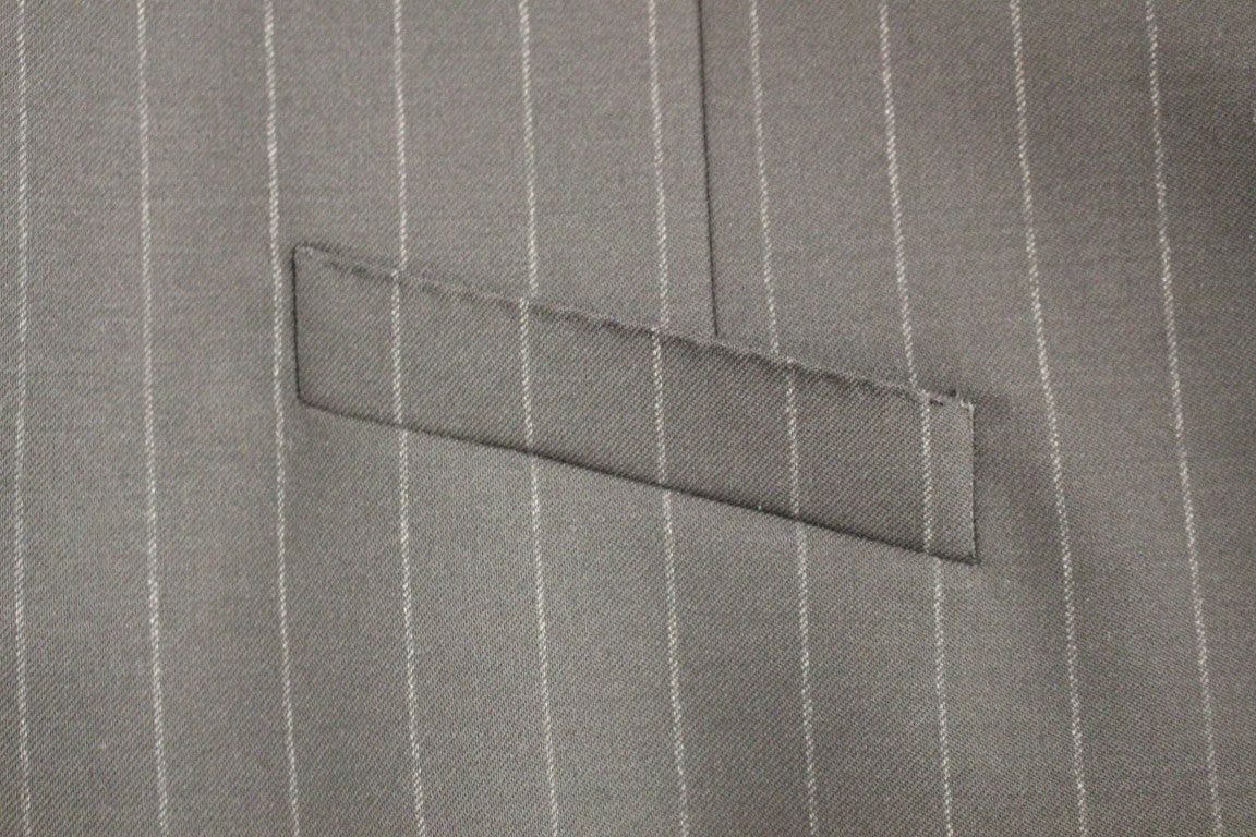 Dolce &amp; Gabbana Élégant gilet en laine à rayures noires