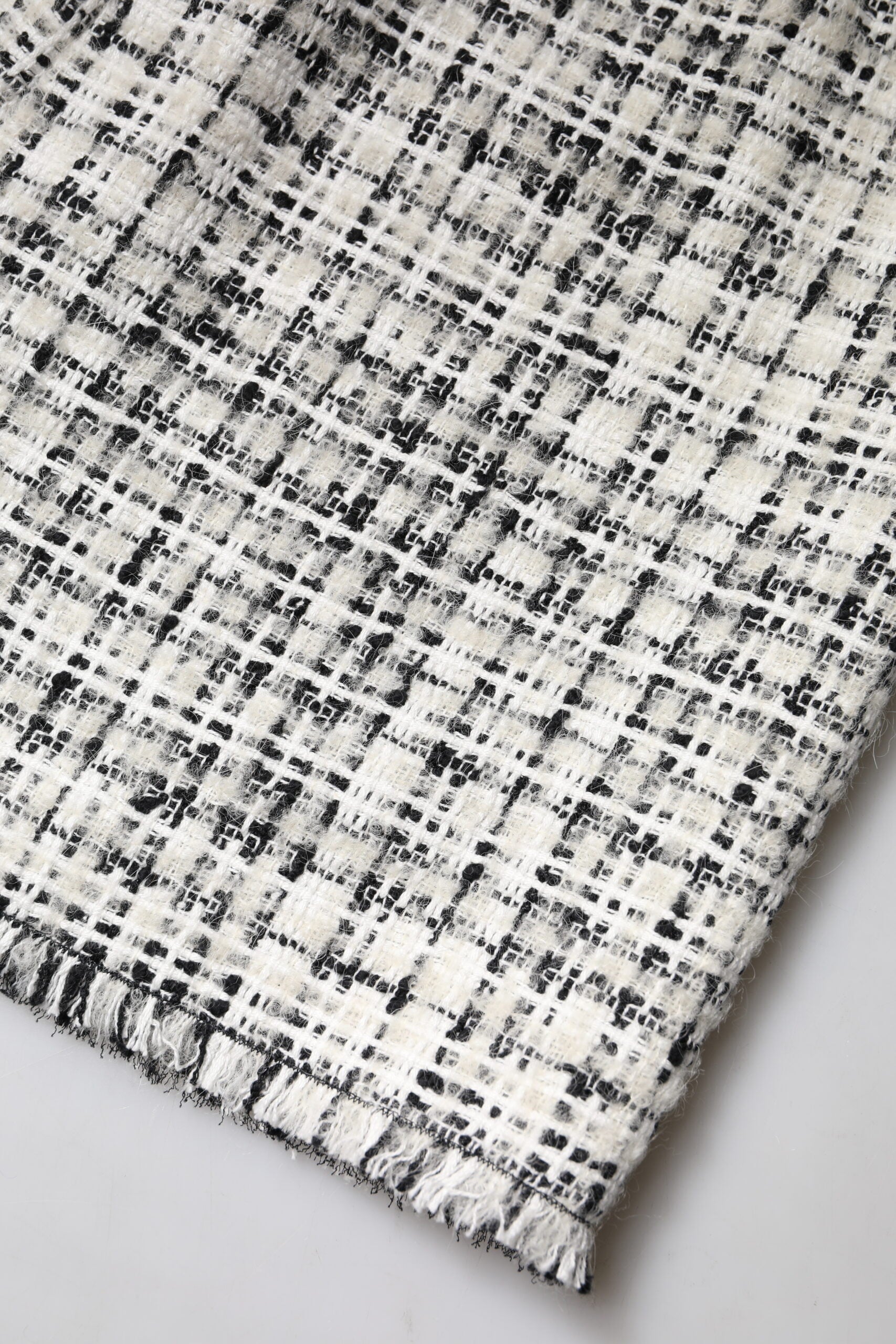 Mini-jupe taille haute en tweed tartan Dolce &amp; Gabbana blanche et noire