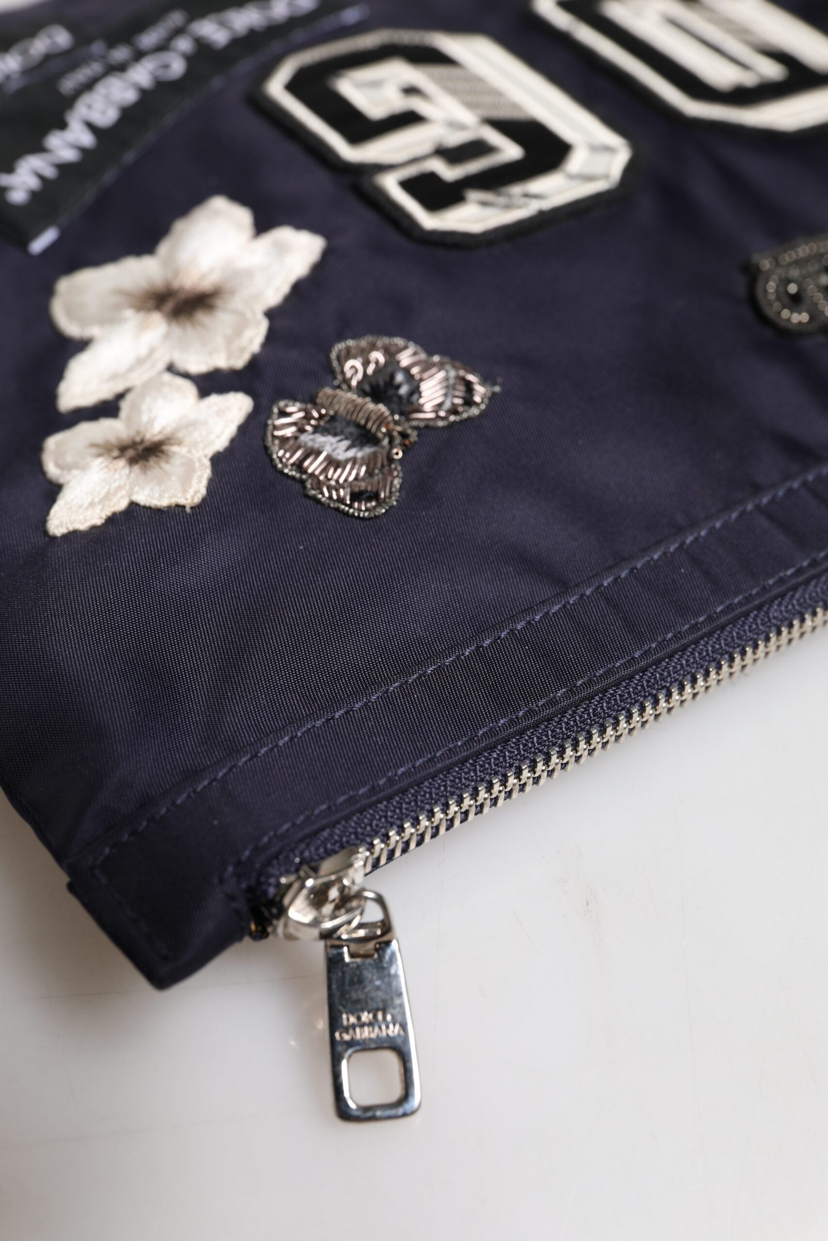 Dolce &amp; Gabbana – Blaue Clutch mit DG-Logo-Patch