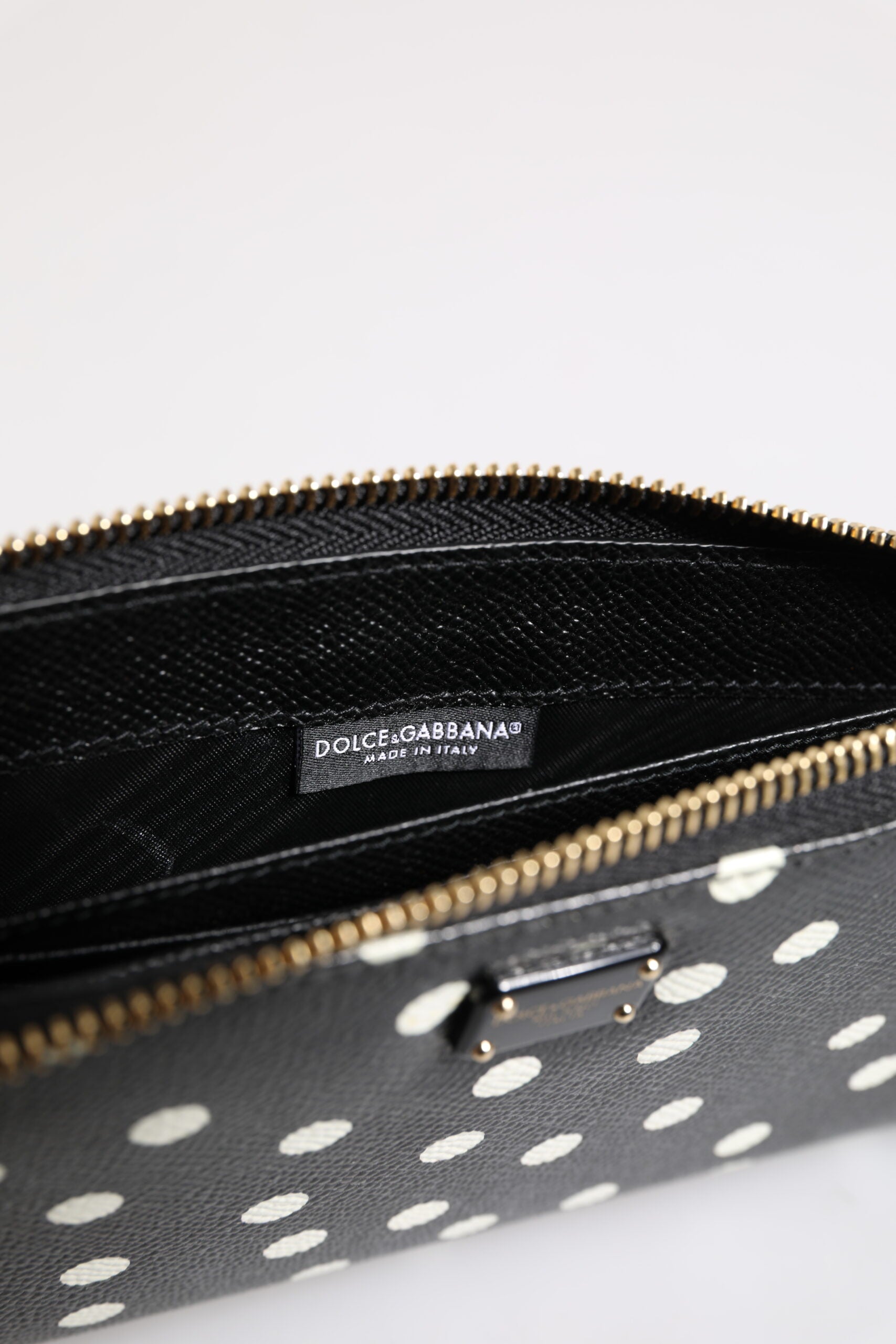 Portefeuille continental zippé Dolce &amp; Gabbana en cuir noir et blanc à pois