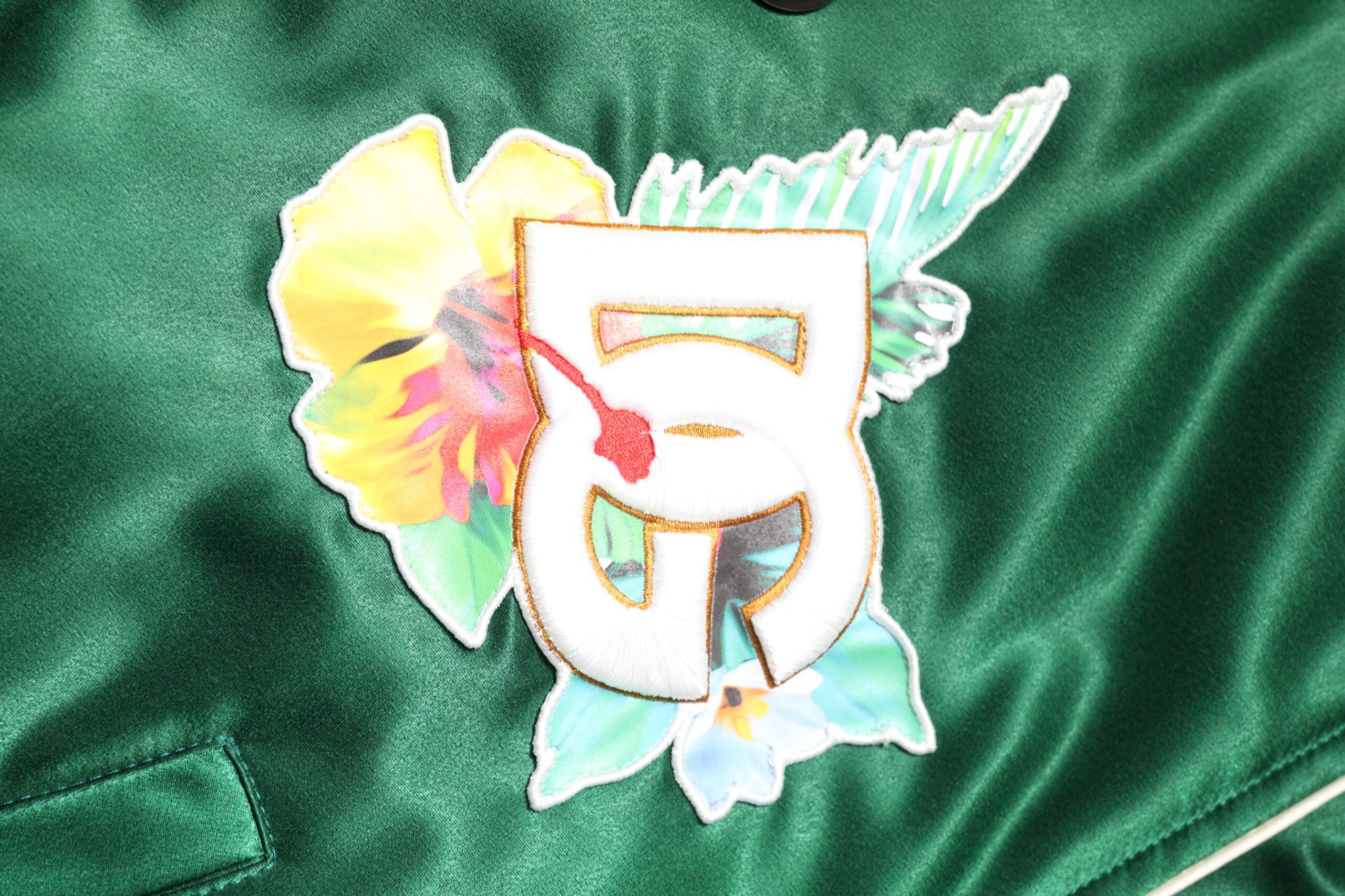 Dolce &amp; Gabbana - Blouson aviateur zippé vert à fleurs et logo DG