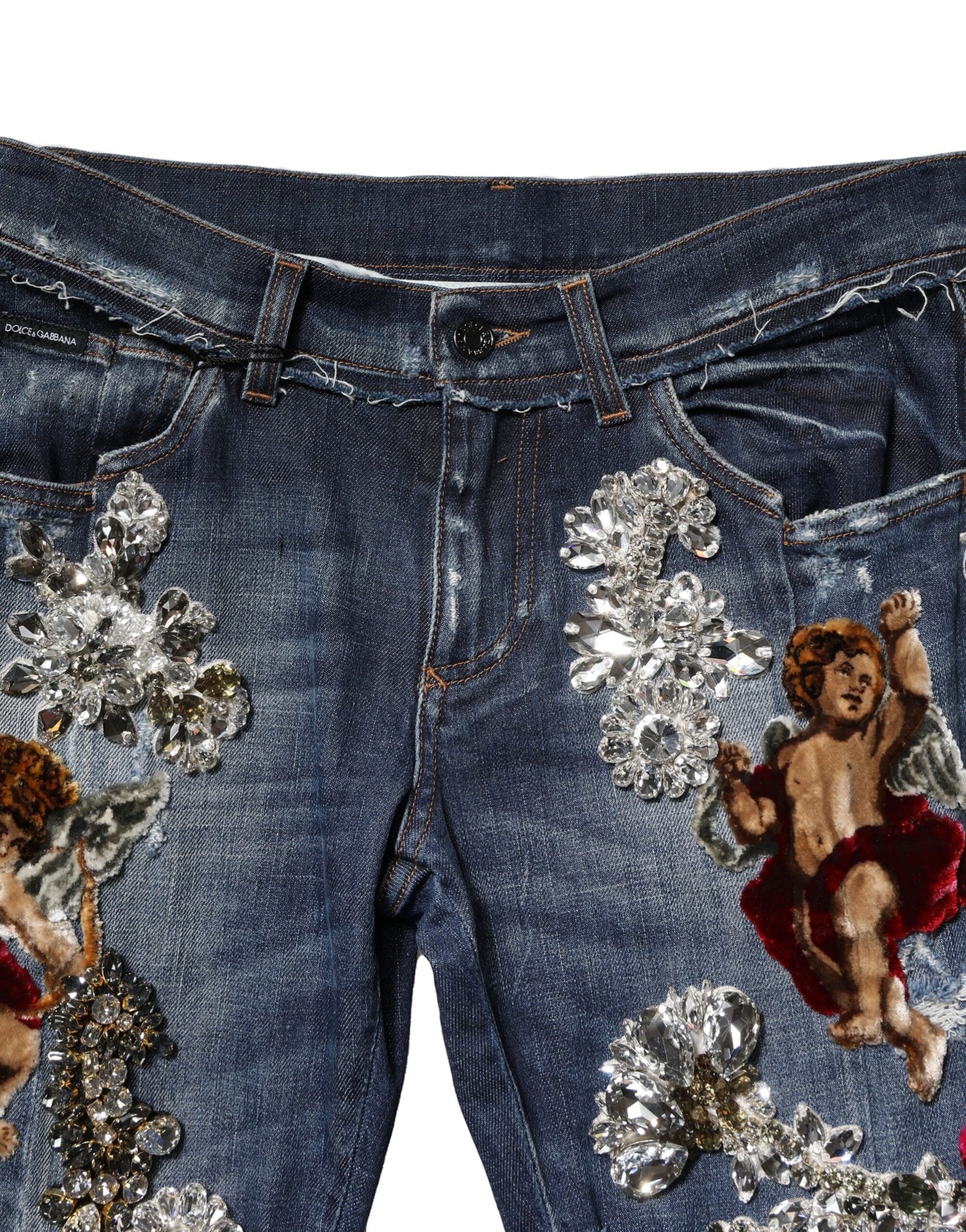 Jean en denim bleu orné de strass Dolce &amp; Gabbana