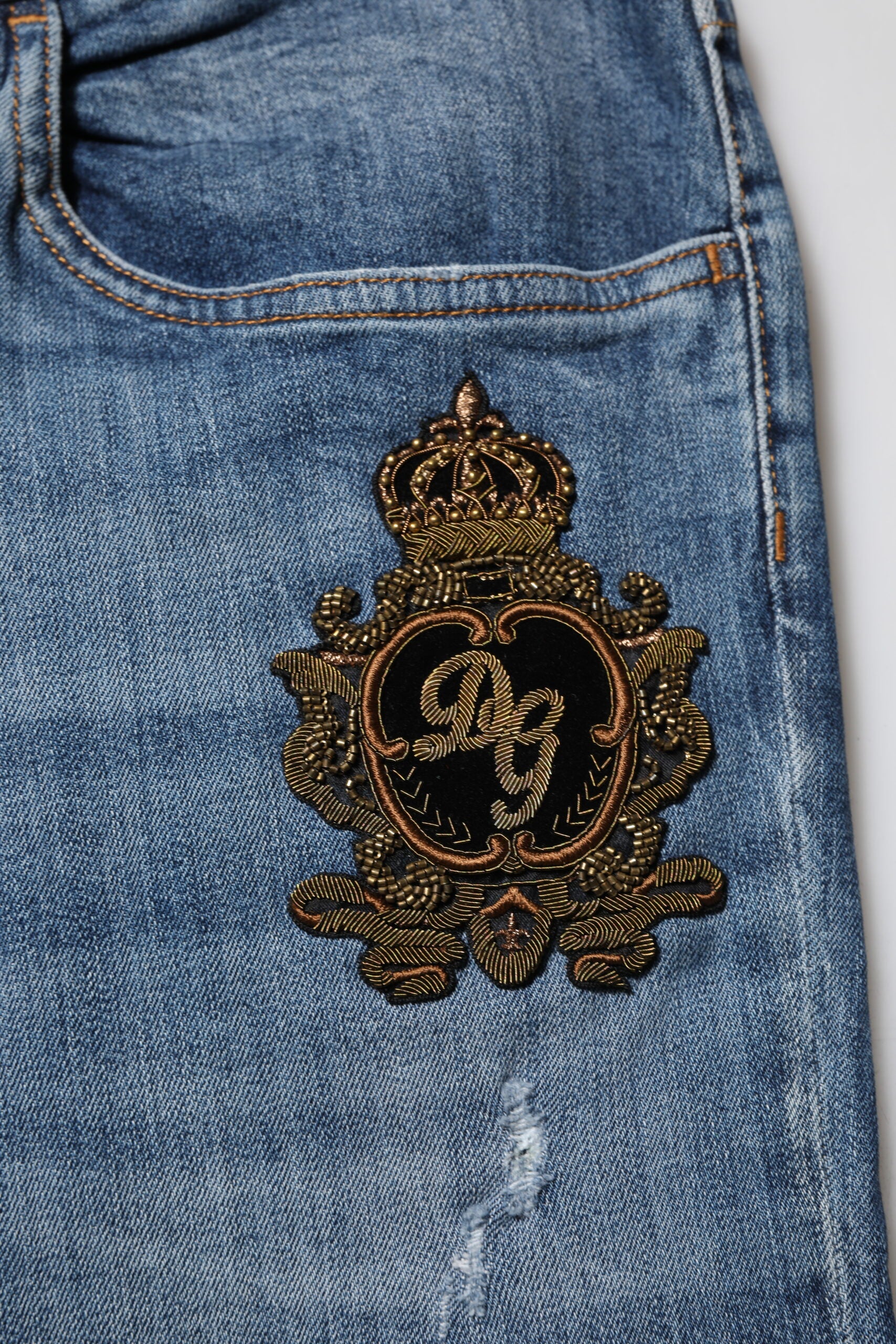 Jean en denim bleu avec logo brodé Dolce &amp; Gabbana