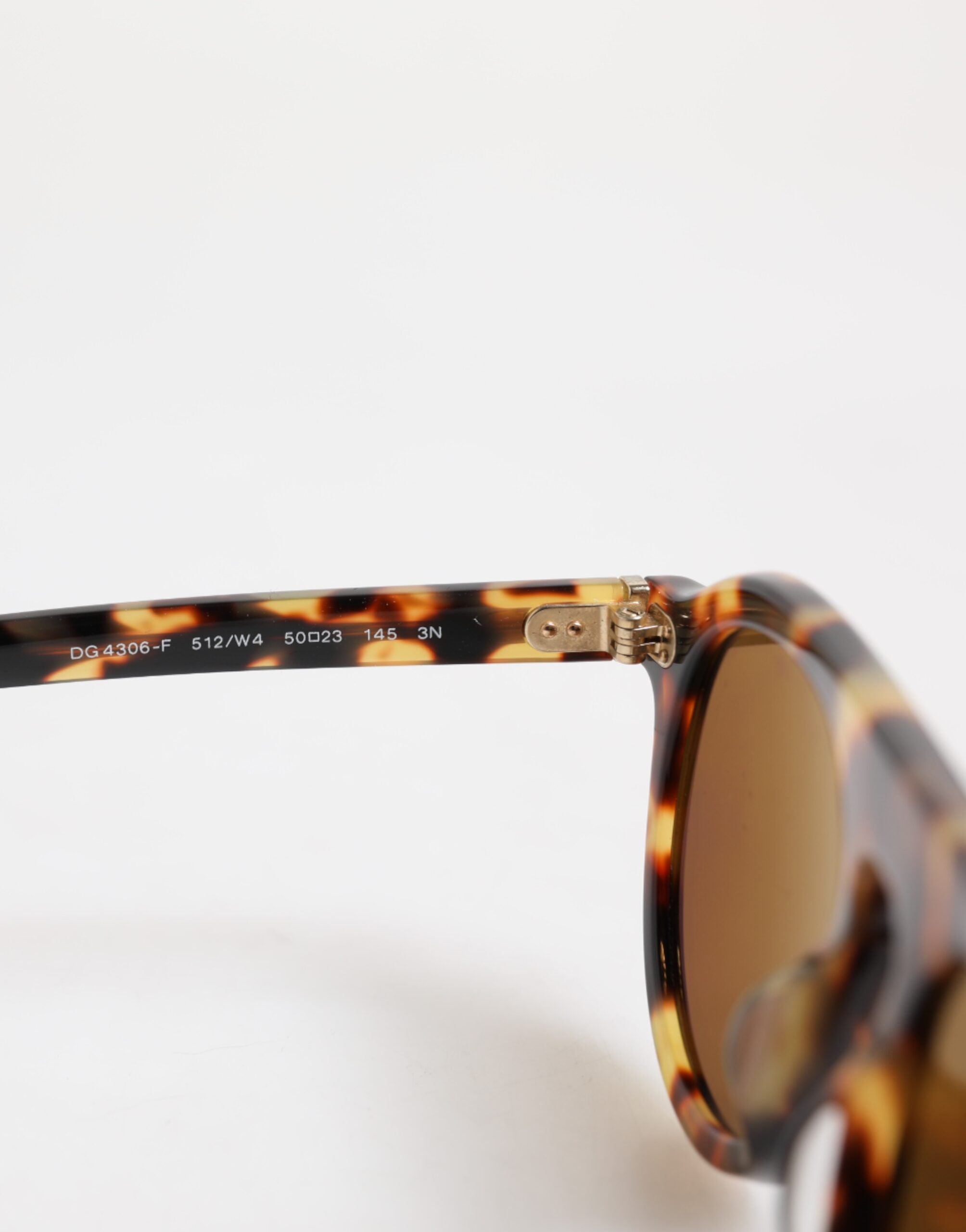Lunettes de soleil rondes en acétate marron à imprimé léopard Dolce &amp; Gabbana