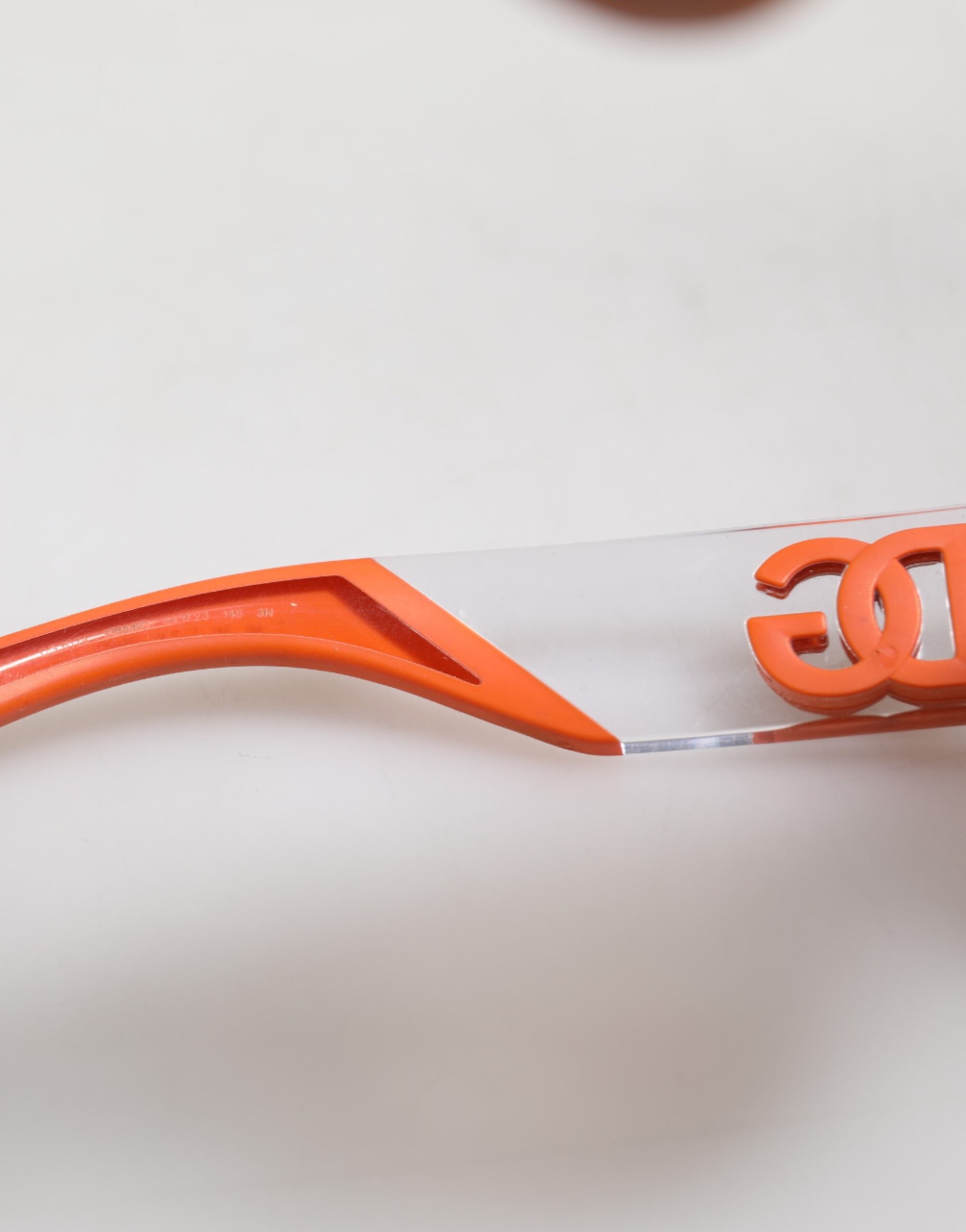 Lunettes de soleil à monture ovale orange Reborn To Live de Dolce &amp; Gabbana avec logo