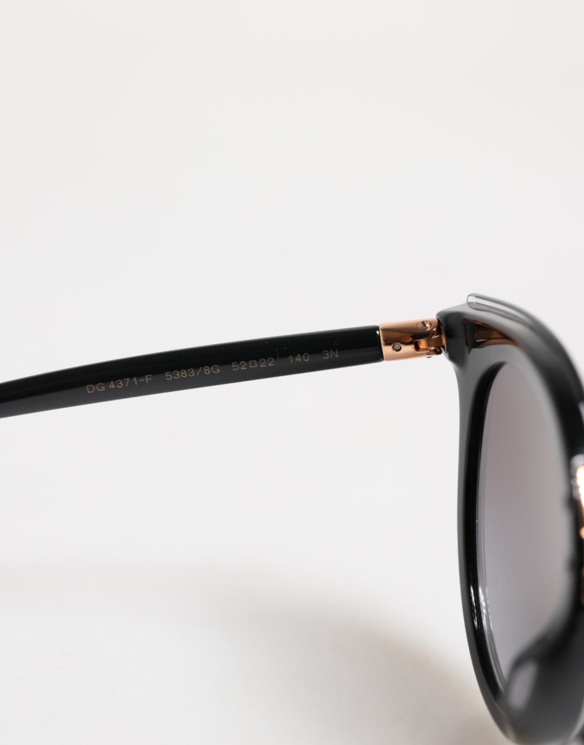 Dolce &amp; Gabbana – Runde Sonnenbrille DG4371-F mit transparentem Rand in Schwarz