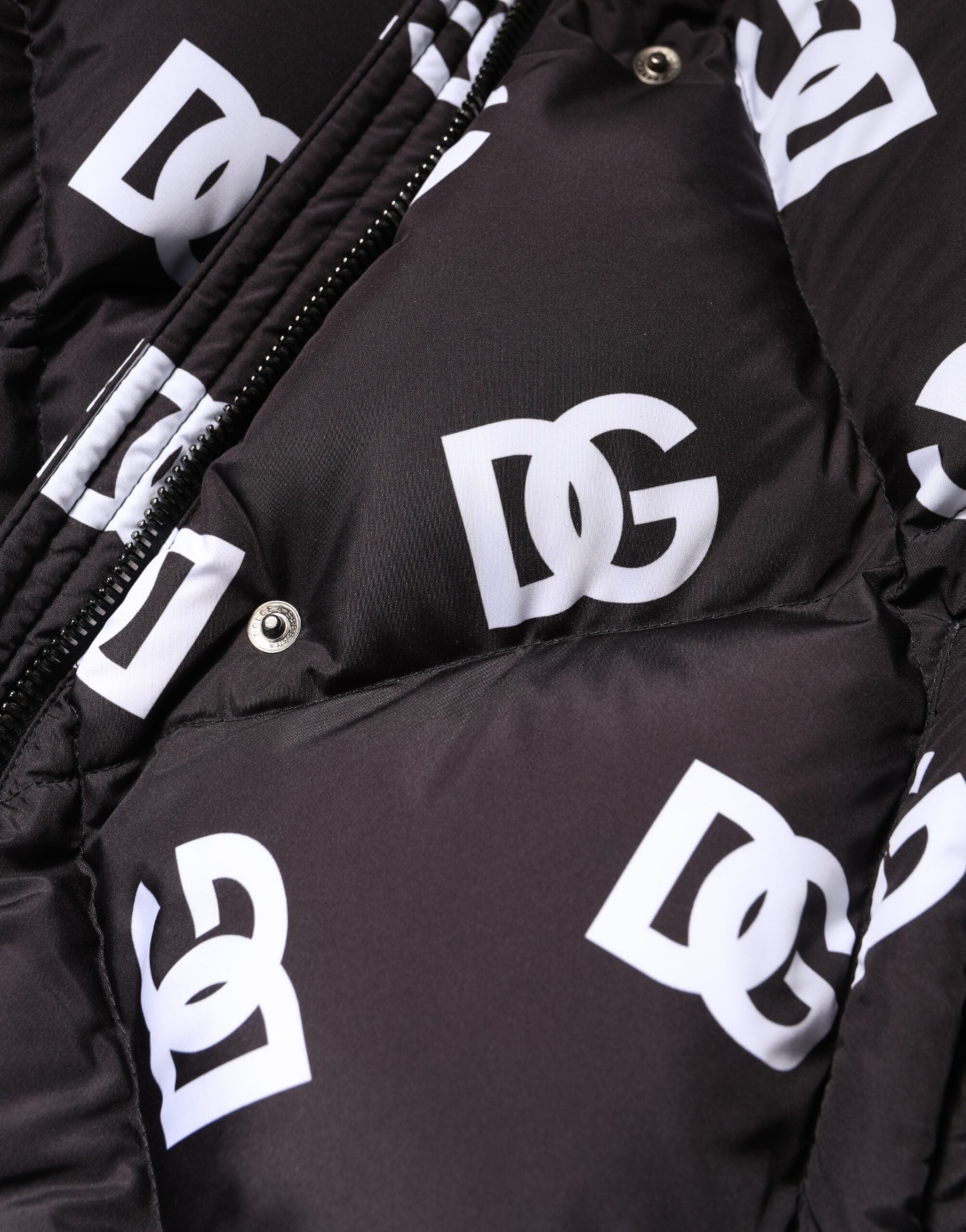 Dolce &amp; Gabbana – Schwarze, gesteppte DG Mania-Pufferjacke in Langmantelform