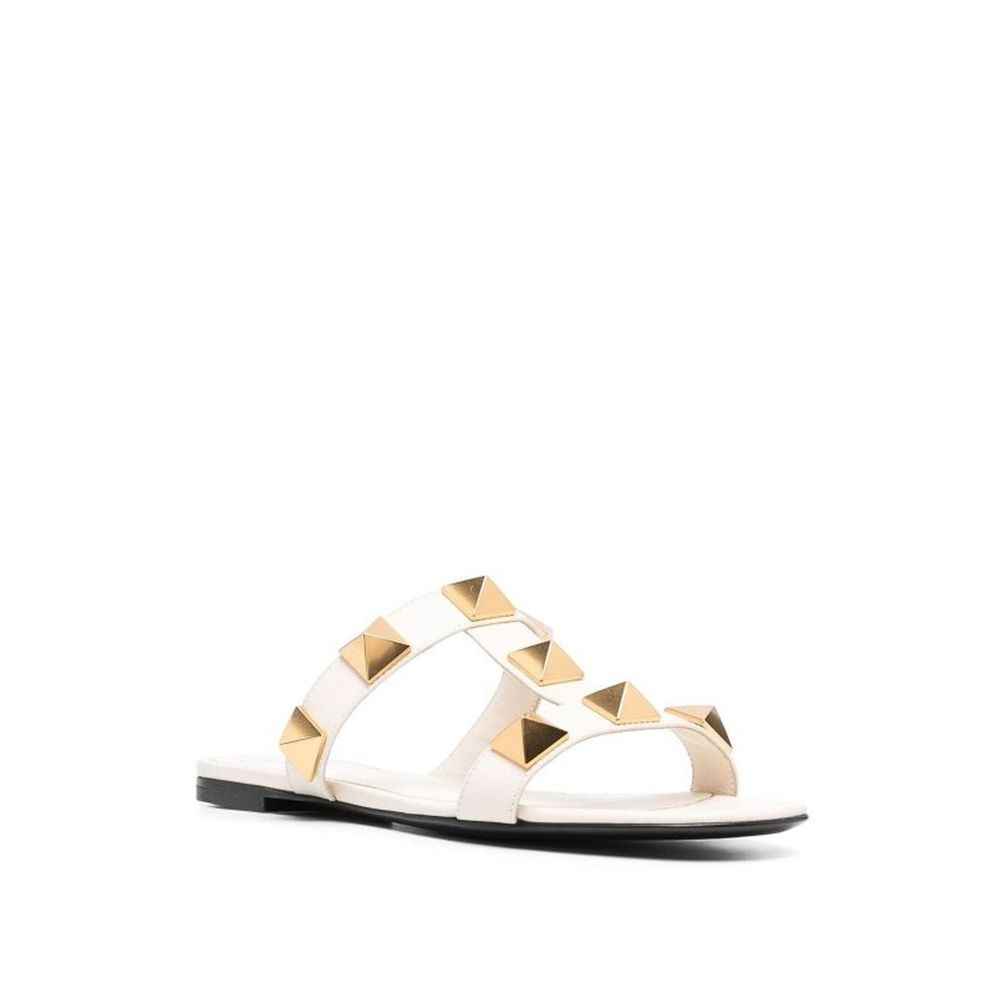 Sandales plates en cuir à clous romains Valentino Garavani