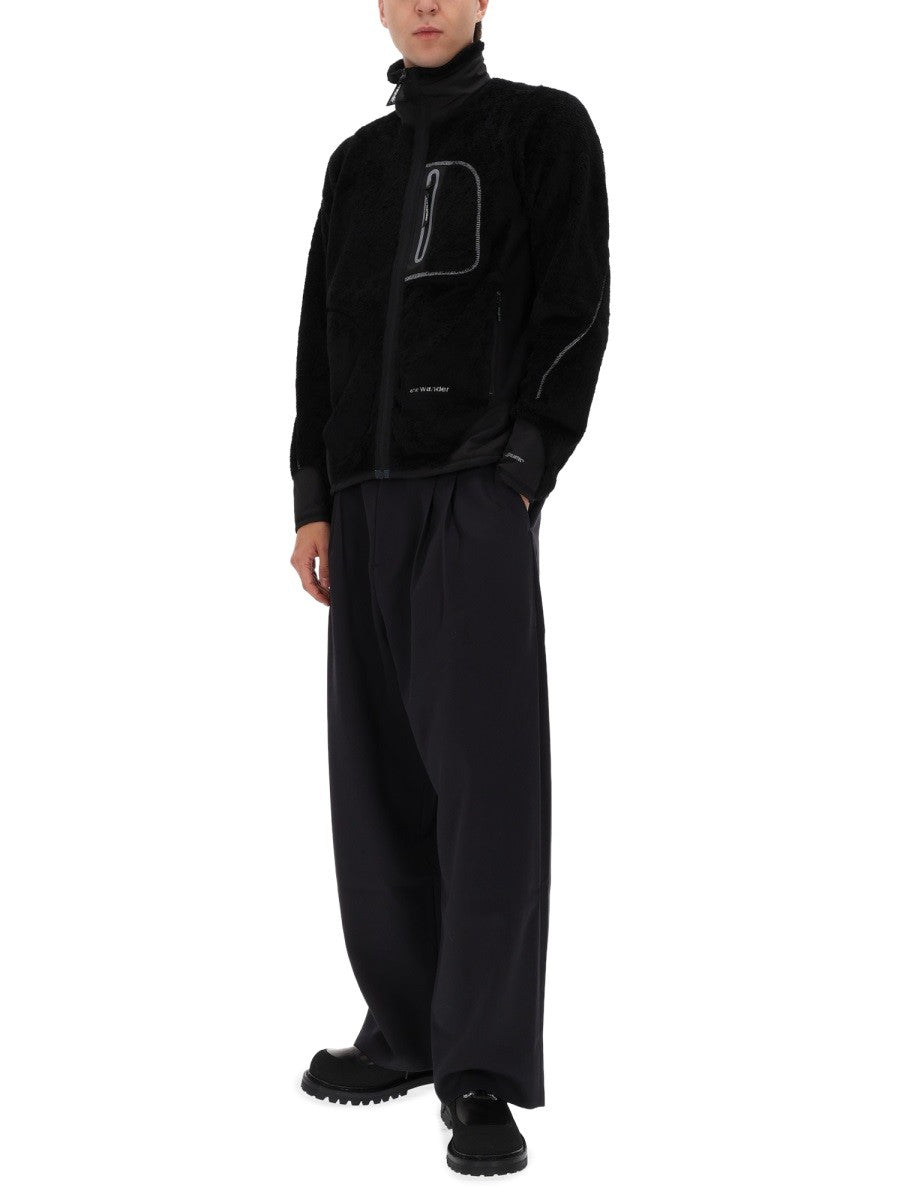 AND WANDER JACKET WITH LOGO