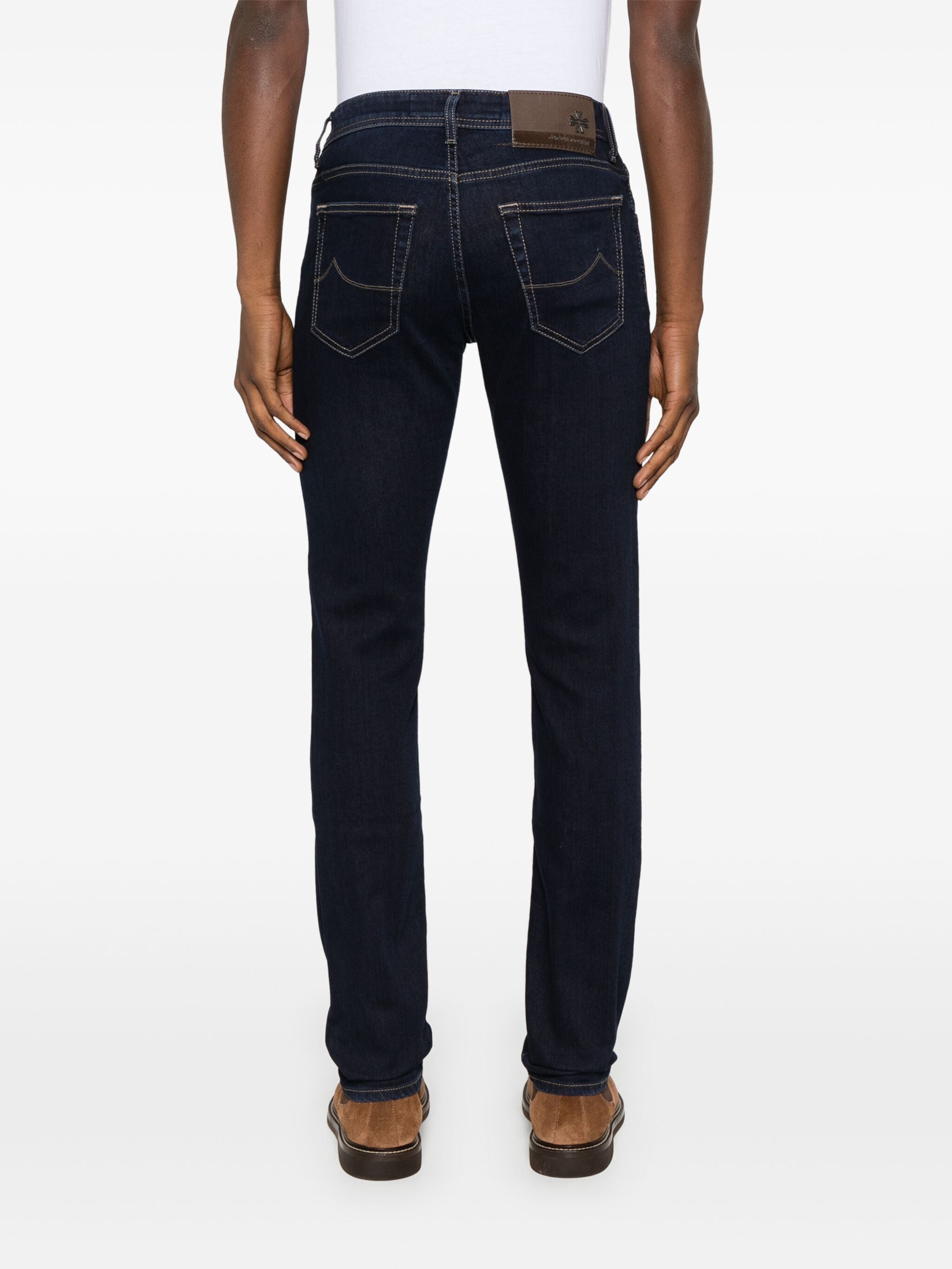 Back view of Jacob Cohen Nick Blue Jeans worn by a model with brown shoes and white shirt