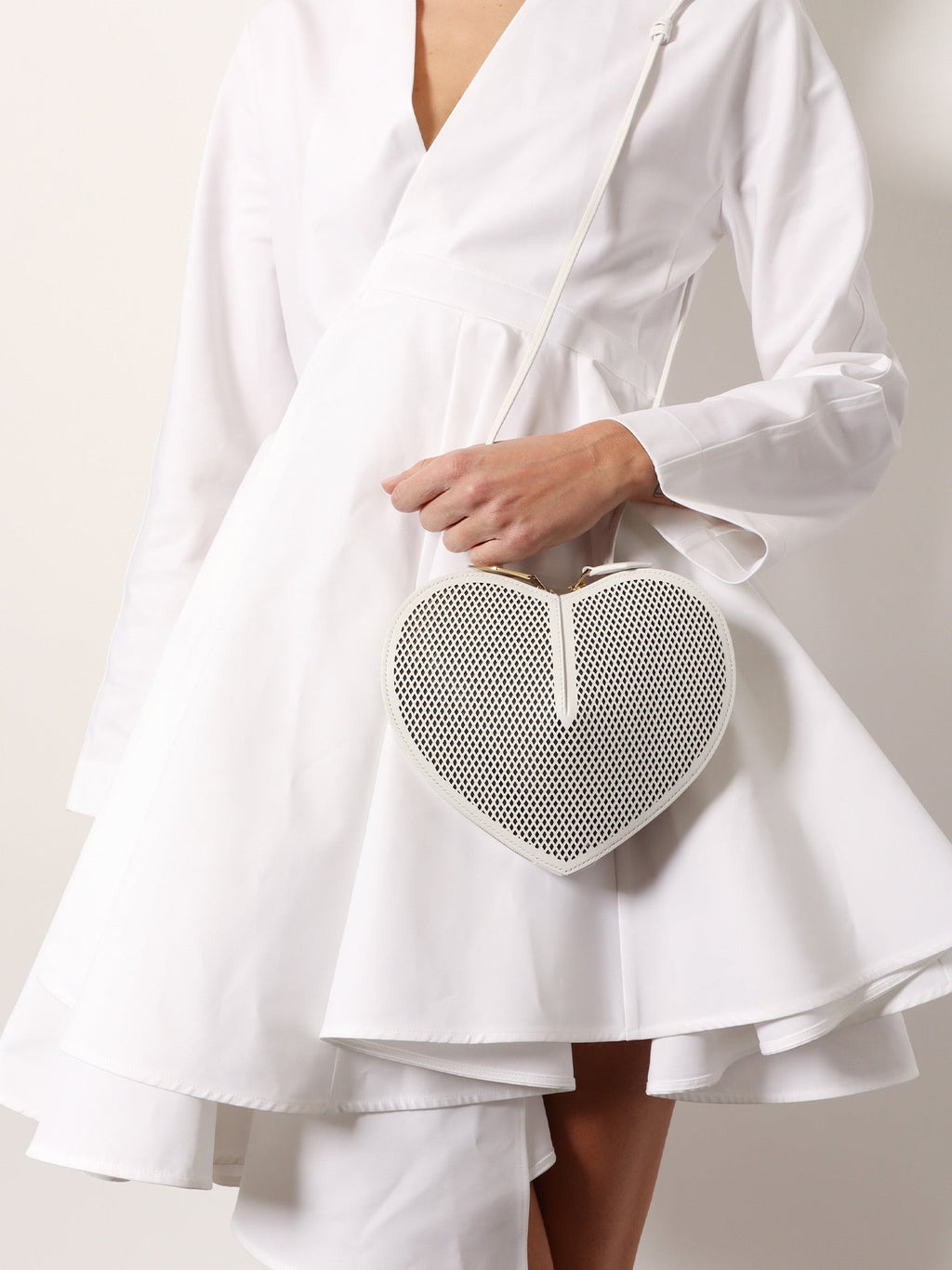 ALAIA Le coeur shoulder bag in leather with fishnet motif