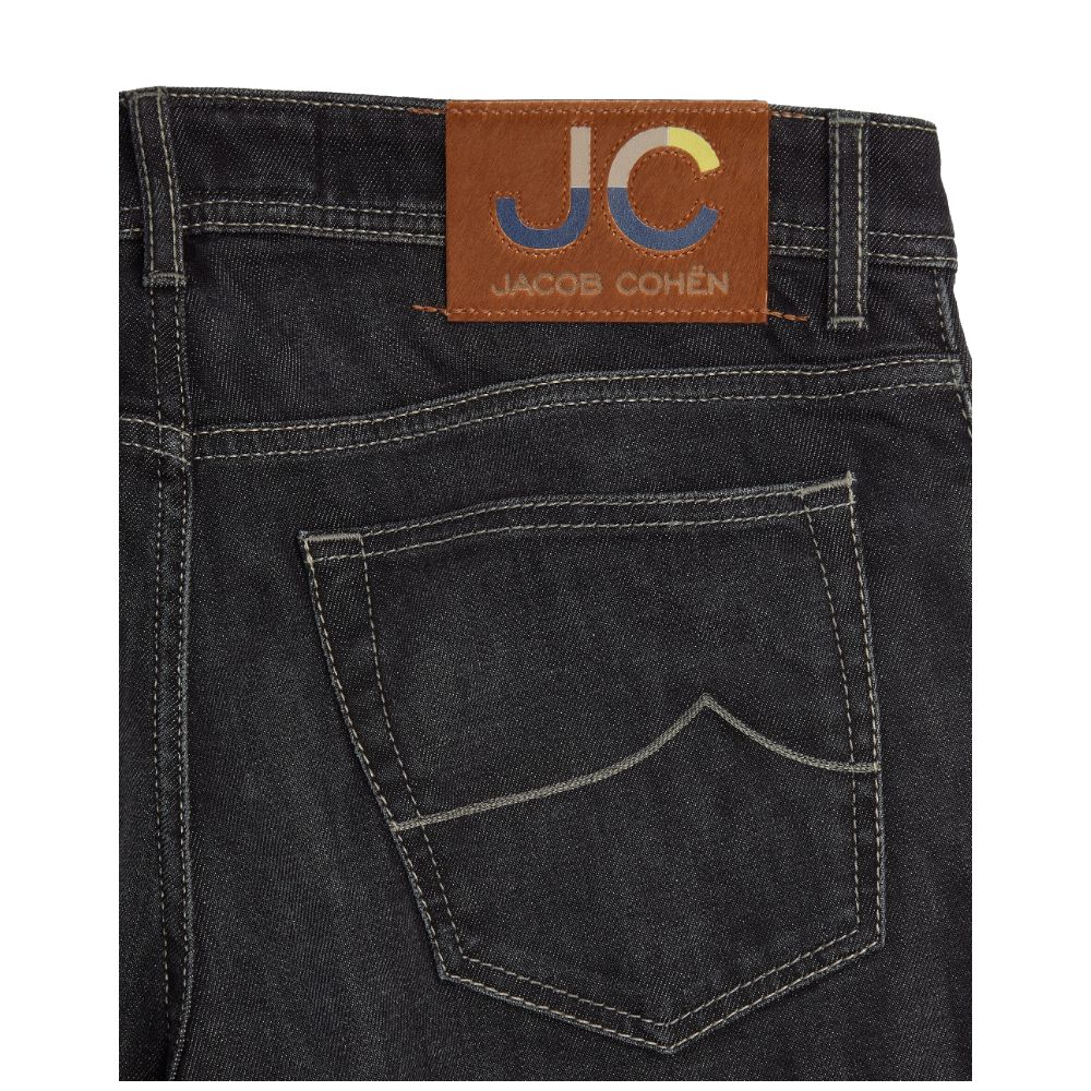 Jacob Cohen Nick Slim cotton jeans in dark denim showing back pocket and leather logo patch