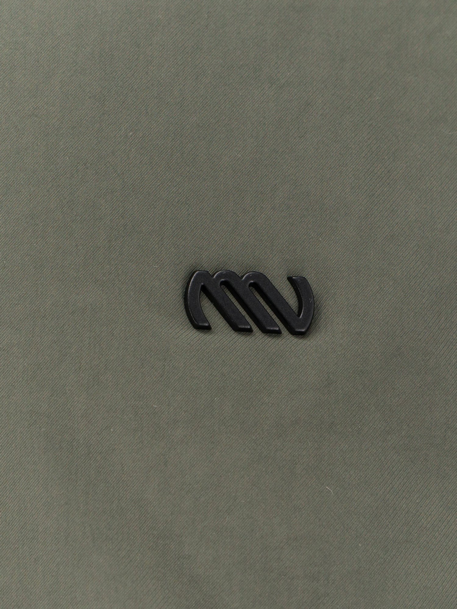 MASSIMO OSTI Nylon jacket with metal logo patch on the front