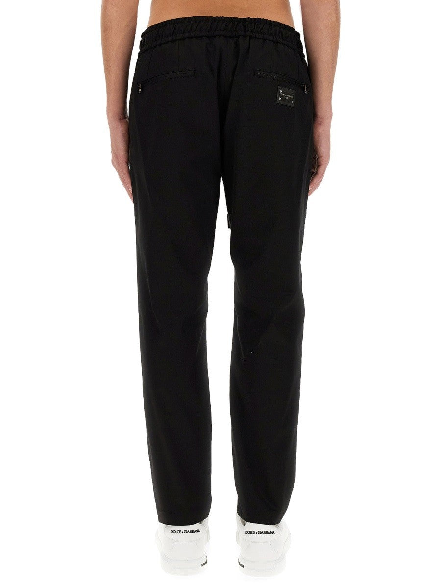 Dolce & Gabbana JOGGING PANTS WITH PLAQUE