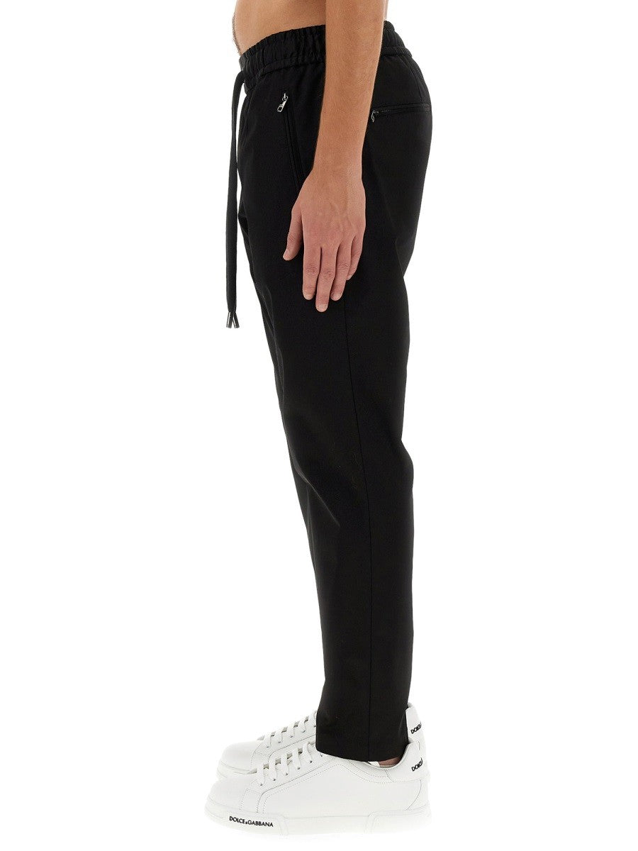 Dolce & Gabbana JOGGING PANTS WITH PLAQUE