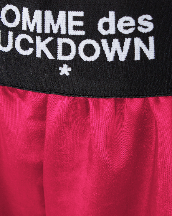 shorts in raso fuxia