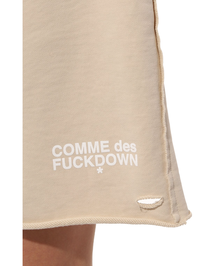 shorts con rotture beige