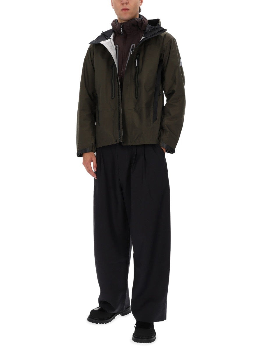 AND WANDER RAIN JACKET