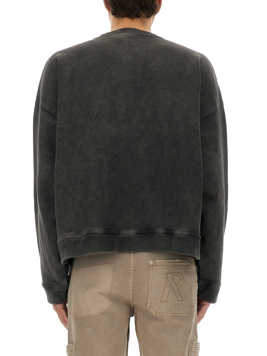 Represent "REP APPLIQUE" SWEATSHIRT