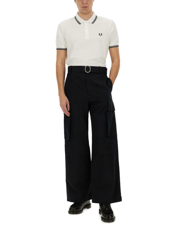 COMME DES GARCONS SHIRT "STRONG WILL" POLO SHIRT