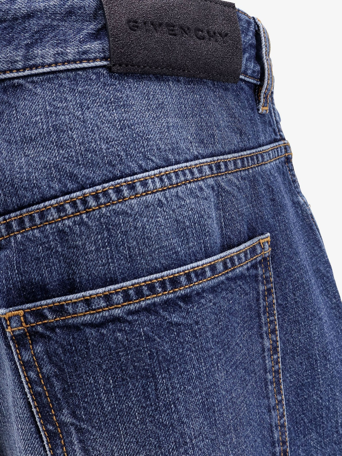 Givenchy Twisted stone-washed denim jeans