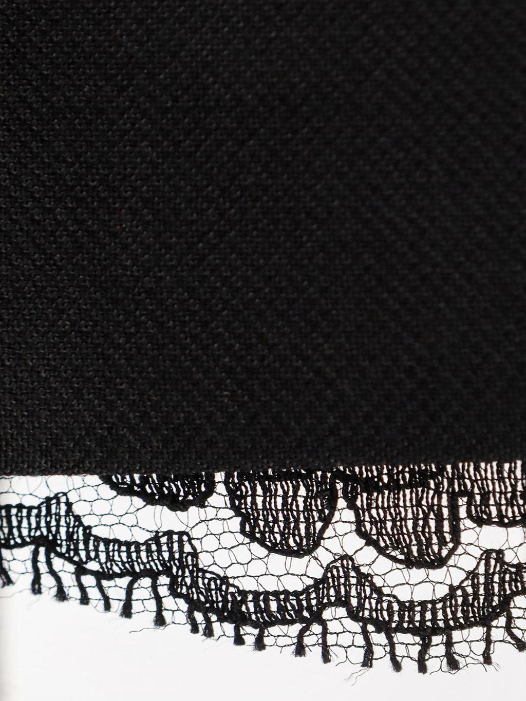 Dolce & Gabbana Virgin wool miniskirt with lace detail